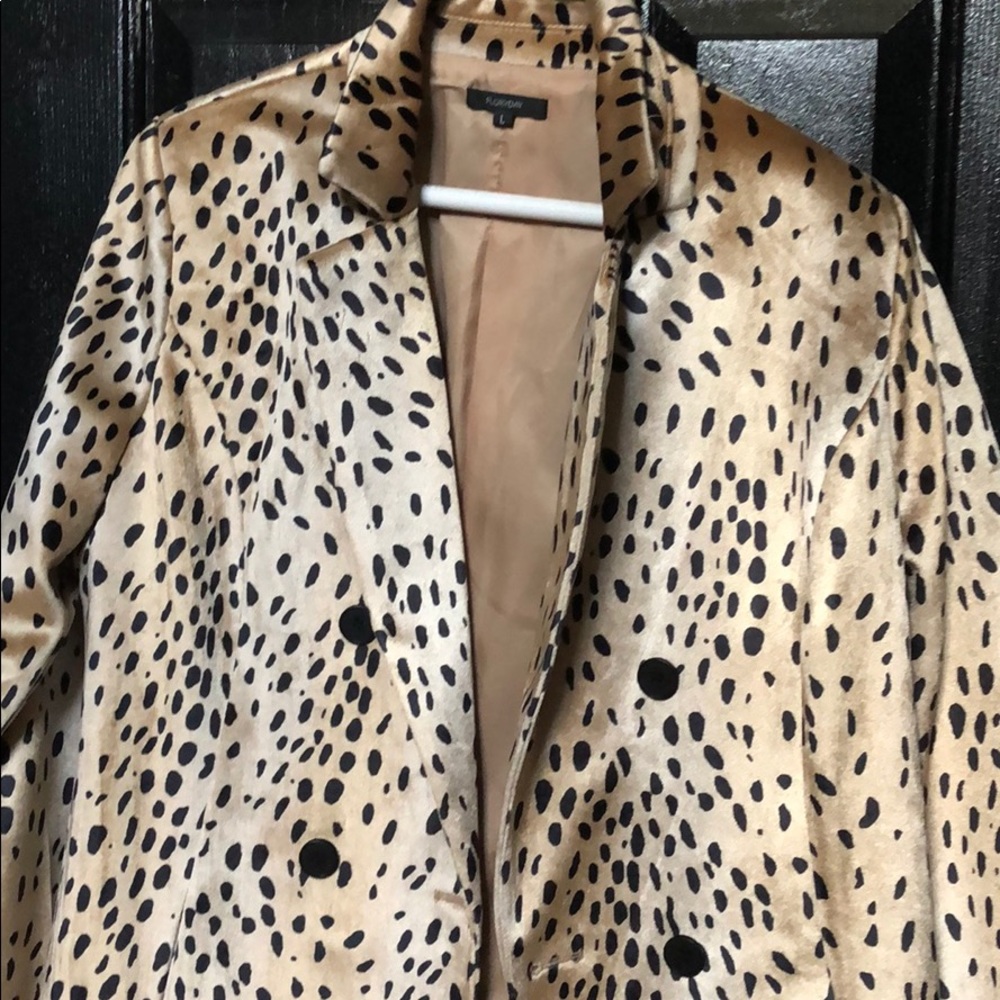 Leopard print coat.